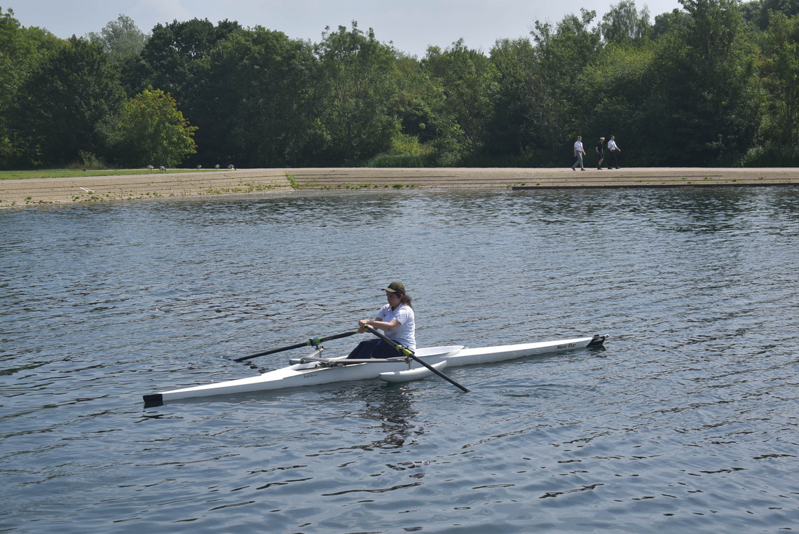 A Single Person Rowing.